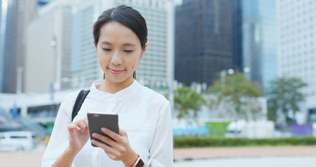 Businesswoman use of cellphone