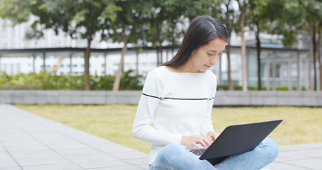 Young Woman work on notebook computer