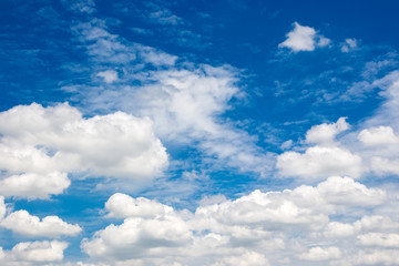 Naklejka na ściany i meble Beautiful group of clouds in the blue sky background.