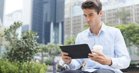 Caucasian businessman use of tablet computer