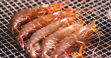 Fresh shrimp on barbecue grill