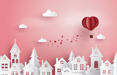 Illustration of Love and Valentine Day,Paper hot air balloon heart shape floating on the sky  over village , Paper art and craft style..