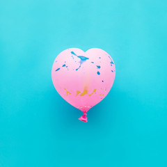 Pink balloon heart  shape on blue background party celebration concept