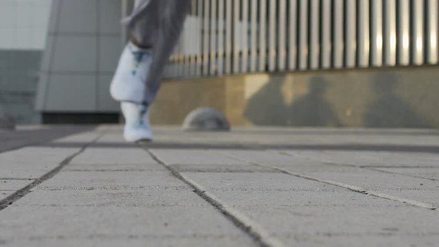 Person involved in sports working out, running session in evening, lifestyle
