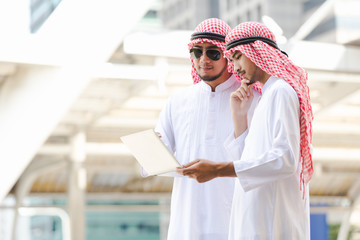Arab business man looking working on plan peper in the city