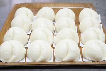 White steamed bun or dim sum at restaurant kitchen