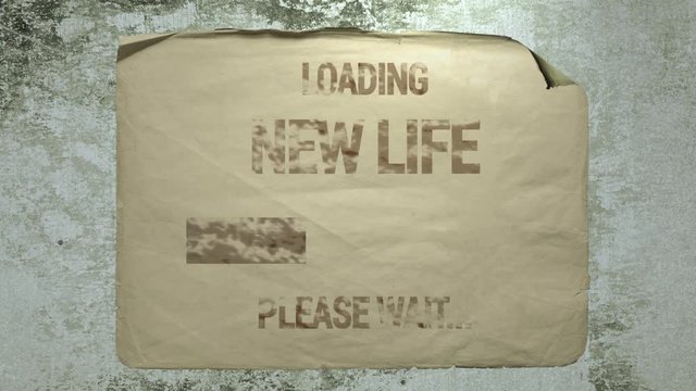 old paper ad on a cement wall with a progress bar inscription loading new life please wait. imitation of camera shake and light flashes.