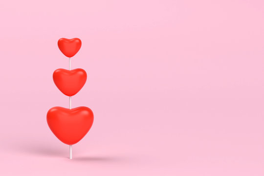 three different size red heart on left hand side in pink background. valentine day concept. minimal style concept