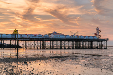 North Sea coast with the beach and the pier in Herne Bay, Kent, England, UK
