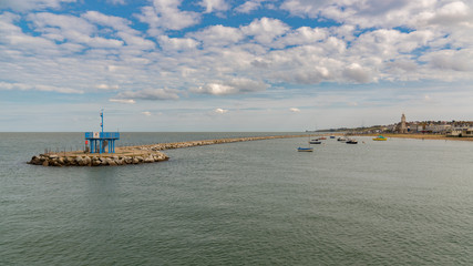 Neptunes Arms and the North Sea coast in Herne Bay, Kent, England, UK