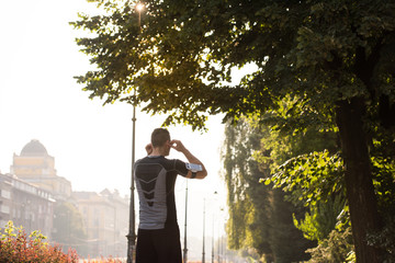 man jogging at sunny morning