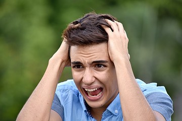 Stressed Youthful Colombian Boy Youngster