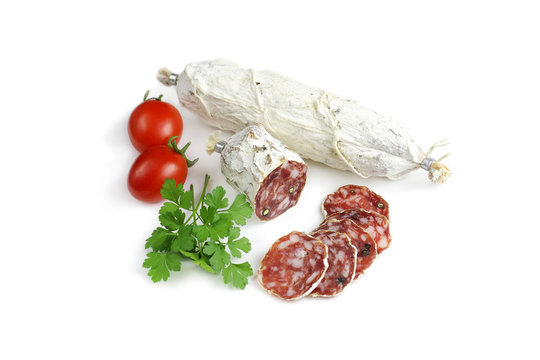 Salami sausages with tomato  isolated on white background 