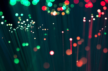 Red and green  optical fibre close up macro shot background image .