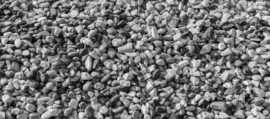 Pebble beach background. Black and white