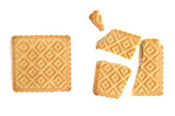 Broken and un broken cookie isolated on white background. Top view of two square biscuit.