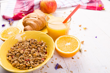 Healthy Breakfast. Various Assortment Set. Orange Juice, Granola, Croissant, and Fruit.