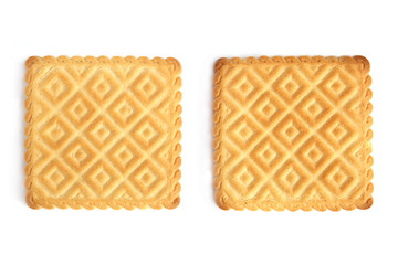 Two square cookies isolated on white background. Top view of two square biscuit.