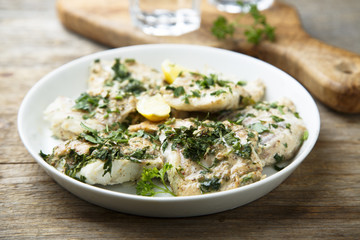 Baked fish with lemond and herbs