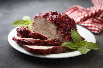 Baked pork with fruit sauce
