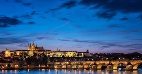 Zelfklevend Fotobehang View on the Charles Bridge and Castle in Prague at night © Horváth Botond