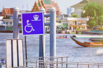 Fototapeta na wymiar Sign at the passenger terminal harbor at Koh Kret Nonthaburi, Thailand.