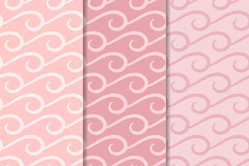 Geometric backgrounds. Pale pink abstract seamless patterns