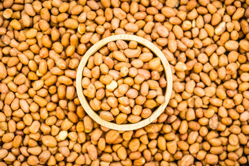 Peanuts in wooden bowl