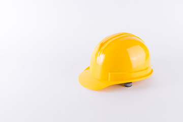 Fototapeta premium Yellow safety helmet on white background. Hard hat isolated on white. Safety equipment concept. Worker and Industrial theme.