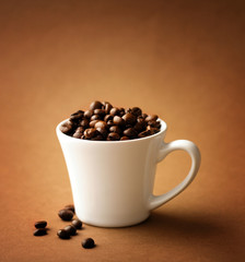 roasted coffee beans in cup