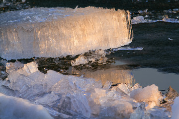 Drifting ice in Siberian river Irtysh under sunset light, Omsk, Russia © Ivan Kuzmin
