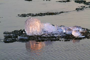 Drifting ice in Siberian river Irtysh under sunset light, Omsk, Russia © Ivan Kuzmin