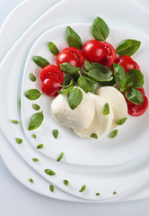 Mozzarella with tomato and  basil.