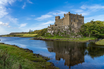 Naklejka na ściany i meble Dunvegan Castle and harbour on the Island of Skye, Scotland