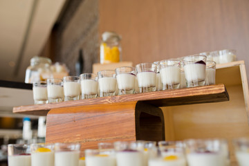 Glass shots  pastry. wedding catering food. mini canapes food.  tasty dessert. Beautiful decorate catering banquet table.  snacks and appetizers. wedding celebration