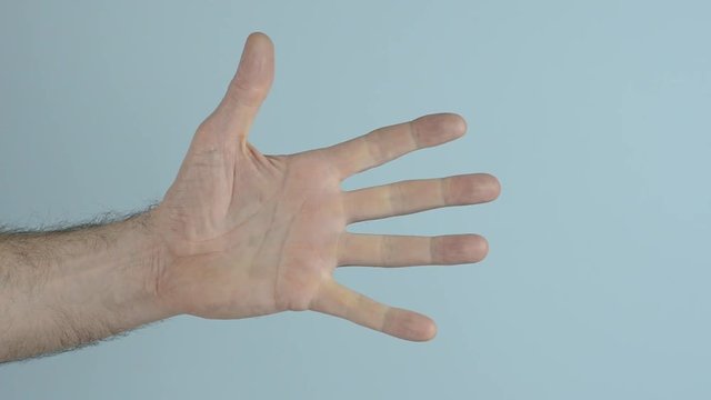 hand on a blue background