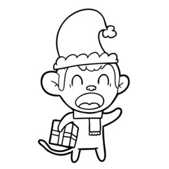 Obraz na płótnie Canvas shouting cartoon monkey carrying christmas gift