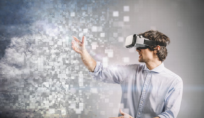 Young man playing in VR goggles. Graphic design.