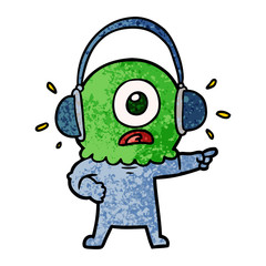 cartoon cyclops alien spaceman pointing wearing headphones