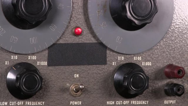 Power toggle switch turned on then off on variable band-pass filter vintage electronic hardware engineering military lab test equipment