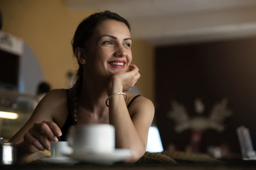 Beautiful woman take a break in a coffee shop.