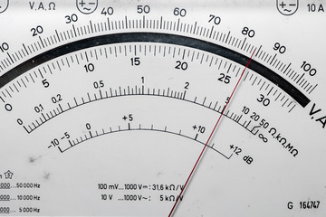 Detail of an analog voltmeter, pointer scale