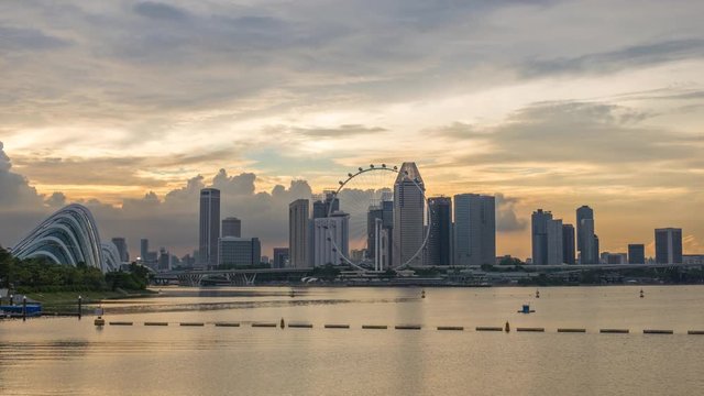 Singapore business district city skyline waterfront sunset timelapse, Marina Bay, Singapore 4K Time lapse