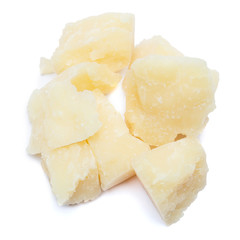 pieces of Parmesan cheese on white background