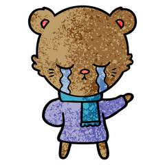 crying cartoon bear wearing winter clothes