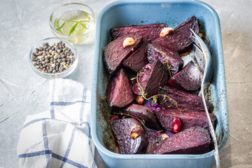 Roasted balsamic honey beetroot in a baking dish. Selective focus, copy space.