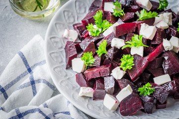 Honey roasted beetroot goat cheese salad. Selective focus, copy space.
