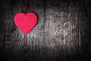 Obraz premium Heart shapes on rustic wooden background