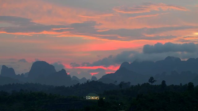 Sunset view of mountains in Khao Sok national park, Thailand. Panning shot