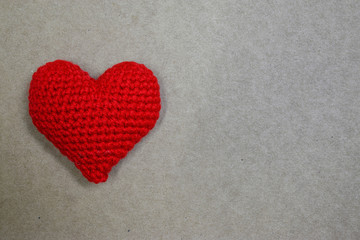 Red heart on paper with copyspace
